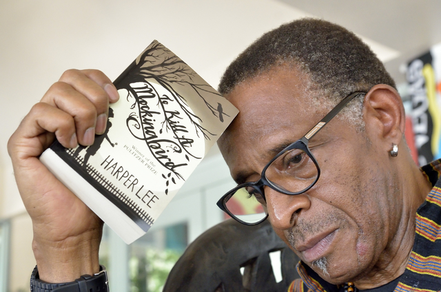 Actor and teacher Antonio Fargas is shown with a copy of Harper Lee's &quot;To Kill a Mockingbird&quot; at the West Las Vegas Arts Center at 947 W. Lake Mead Blvd. in Las Vegas on Friday,  ...