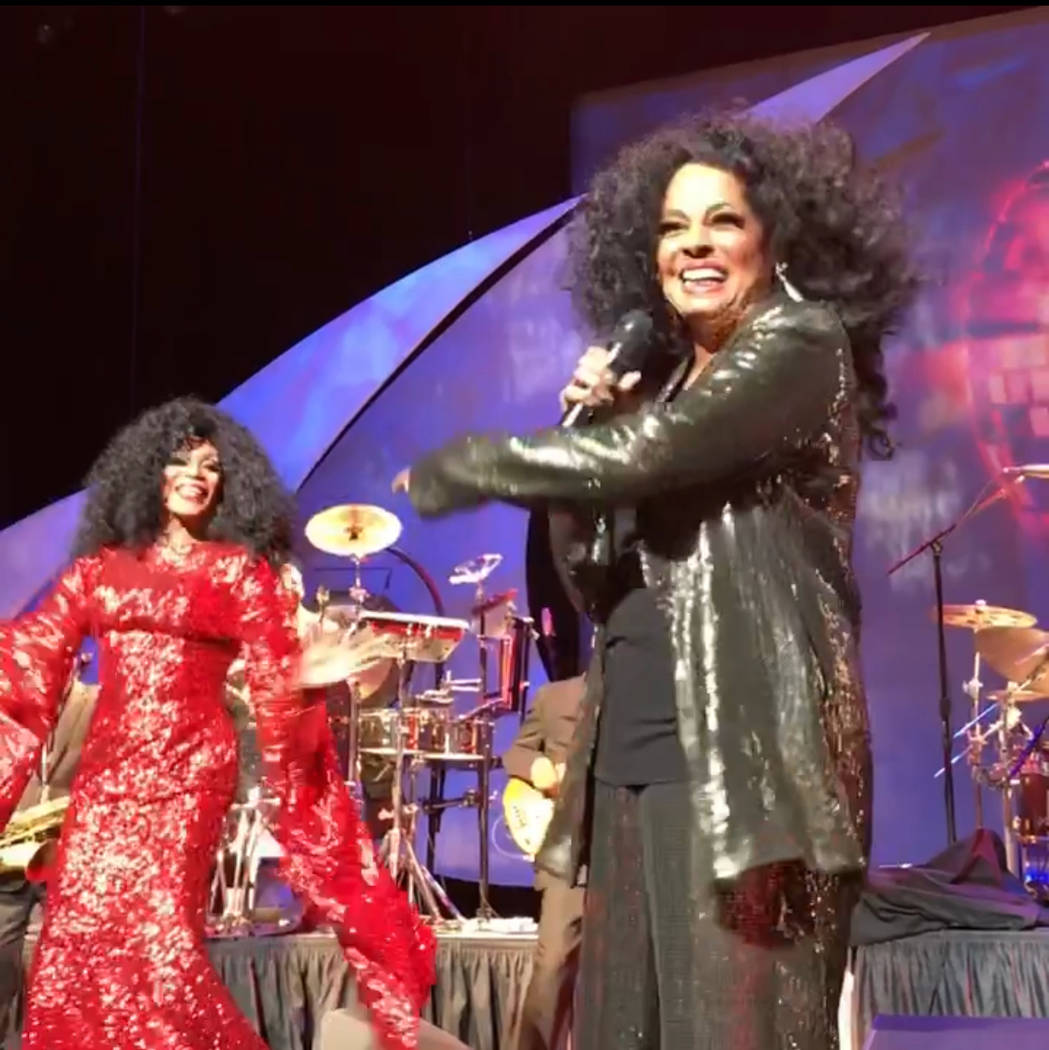 Chris Woods, left, hits the stage with Diana Ross at Encore Theater on Saturday, Oct. 21, 2017. (Frank Marino)
