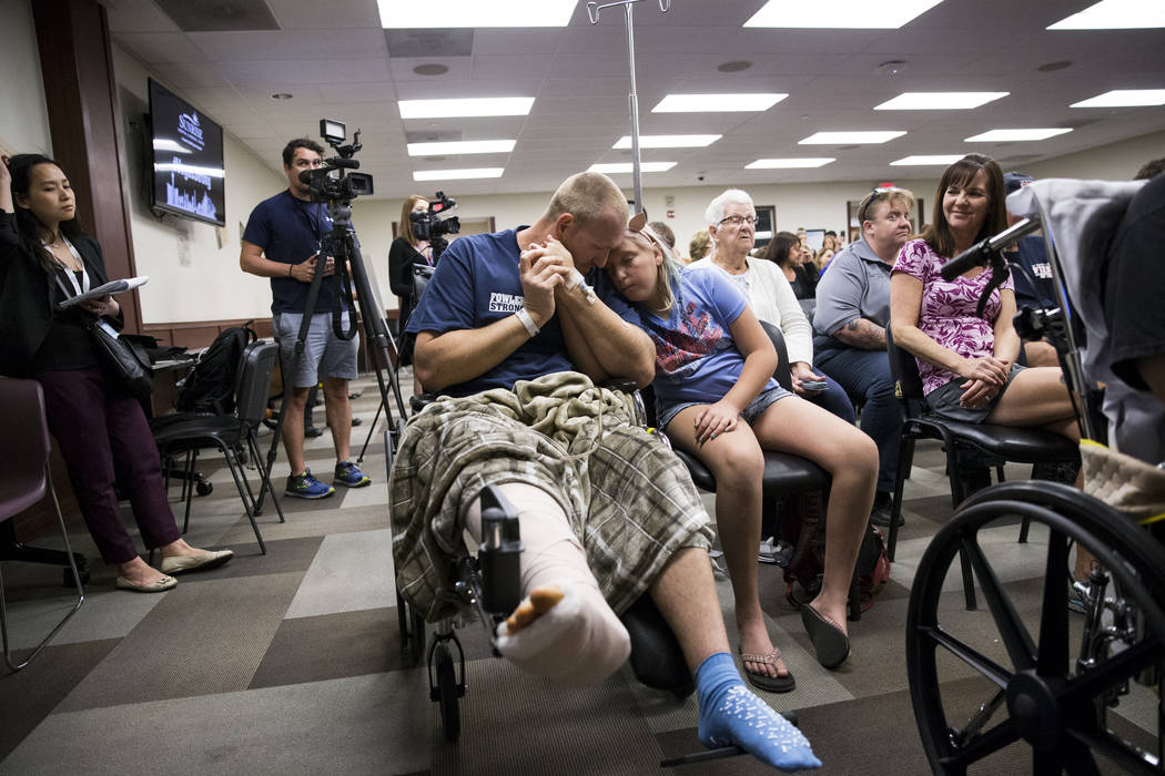 Kurt Fowler with his daughter Timori, 10, of Lake Havasu City, Ariz., at Sunrise Hospital and Medical Center during a concert for patients and staff in Las Vegas, Wednesday, Oct. 11, 2017. Kurt Fo ...