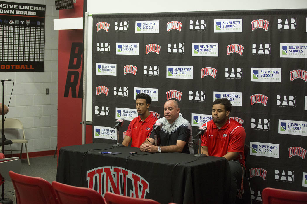 UNLV wide receiver Brandon Presley, left,  head coach Tony Sanchez and defensive lineman Mike Hughes Jr. during a press conference at UNLV's Lied Athletic Complex in Las Vegas on Tuesday, Oct. 3 ...