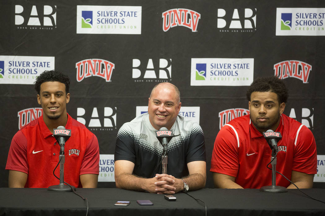 UNLV wide receiver Brandon Presley, left, head coach Tony Sanchez and defensive lineman Mike Hughes Jr. during a press conference at UNLV's Lied Athletic Complex in Las Vegas on Tuesday, Oct. 31 ...