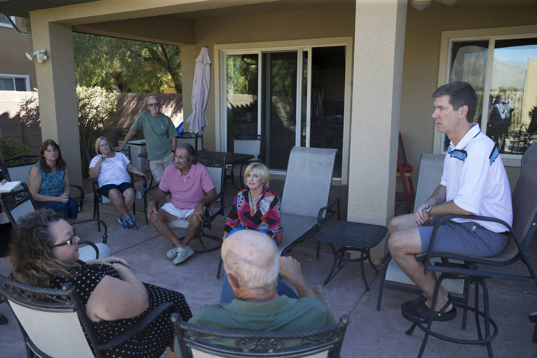 Residents at Silverstone Ranch discuss the closure of their community's golf course at one of their homes in Las Vegas, Tuesday, Oct. 24, 2017. Erik Verduzco Las Vegas Review-Journal @Erik_Verduzco