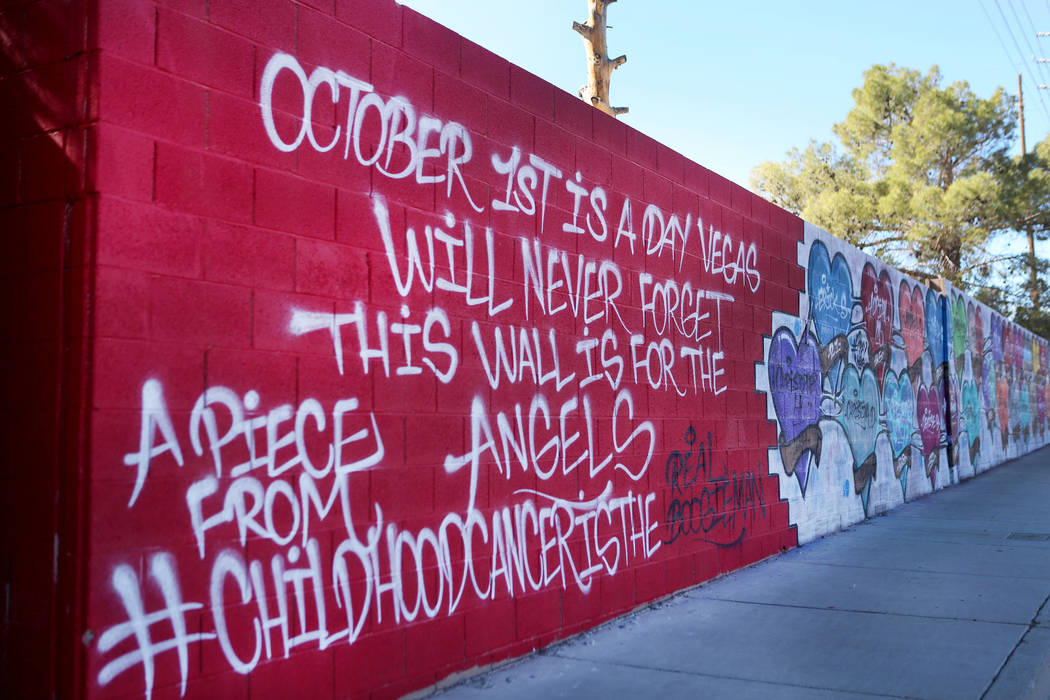 A mural with each name and age of the fallen victims killed in the Route 91 Harvest festival, located off of Westcliff Drive and Antelope Way in Las Vegas, Tuesday, Oct. 24, 2017. Elizabeth Brumle ...