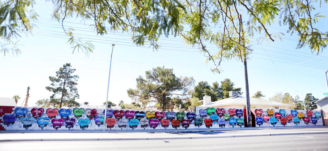 A mural with each name and age of the fallen victims killed in the Route 91 Harvest festival, located off of Westcliff Drive and Antelope Way in Las Vegas, Tuesday, Oct. 24, 2017. Elizabeth Brumle ...