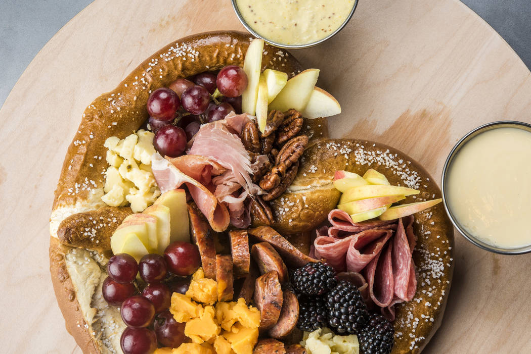 Topgolf Serves A Massive Pretzel Piled High With Sides Video Las Vegas Review Journal