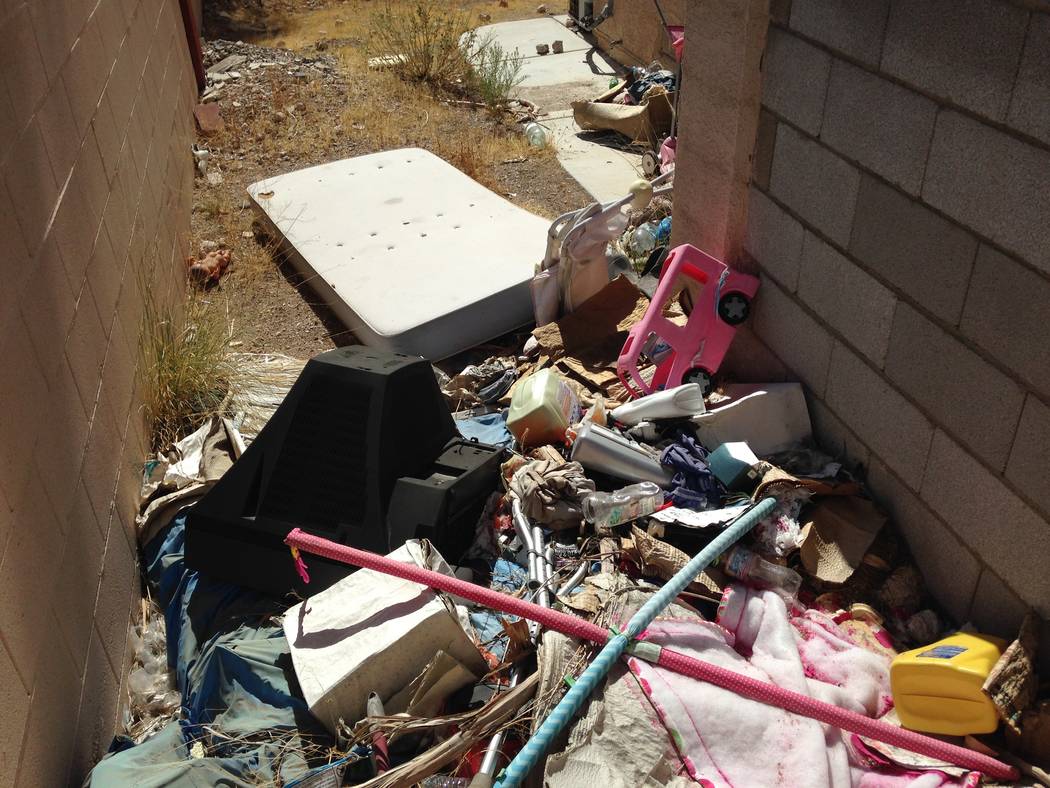 The backyard of an abandoned house near Buffalo Drive and Lake Mead Boulevard in Las Vegas is seen on Thursday, Oct. 12, 2017. (Eli Segall/Las Vegas Review-Journal)