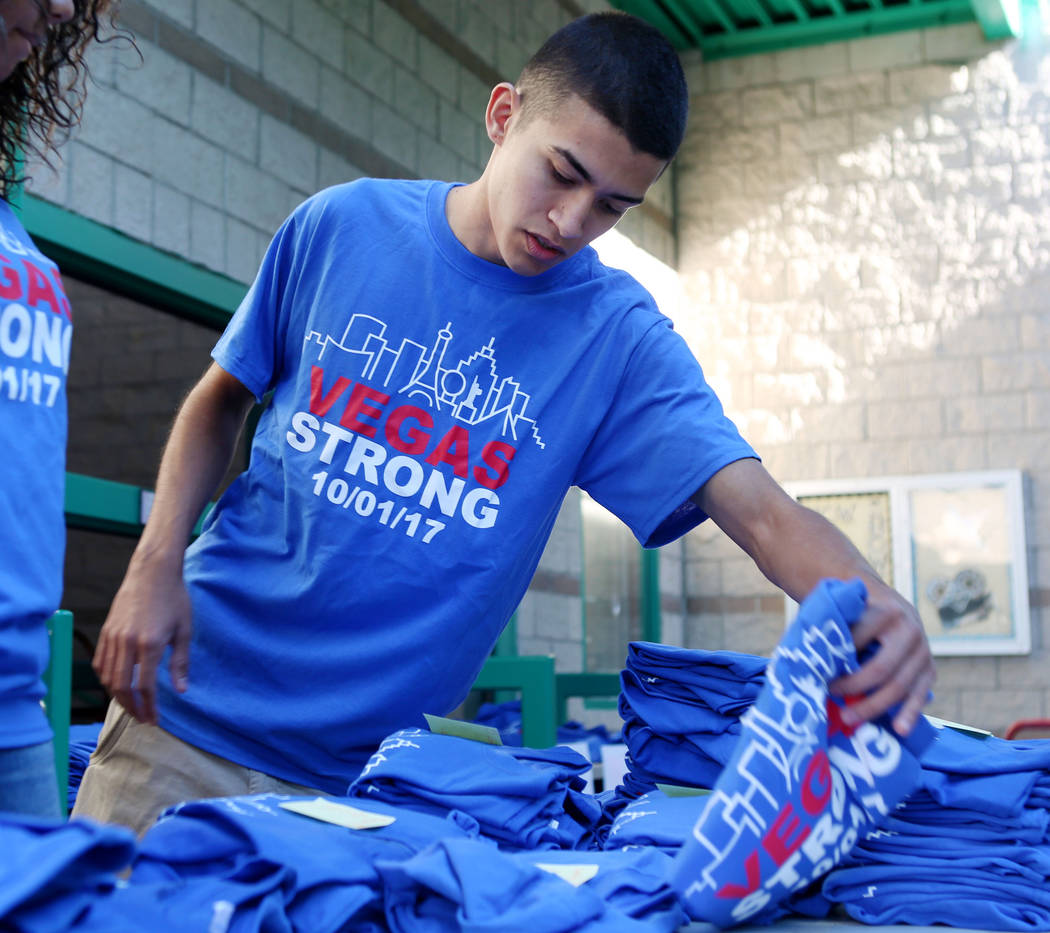 Senior Joey Hughes, 17, organizes for schools to pick up their order of Las Vegas Strong T-shirts at Green Valley High School in Las Vegas, Wednesday, Oct. 25, 2017. More than 130 schools in the C ...