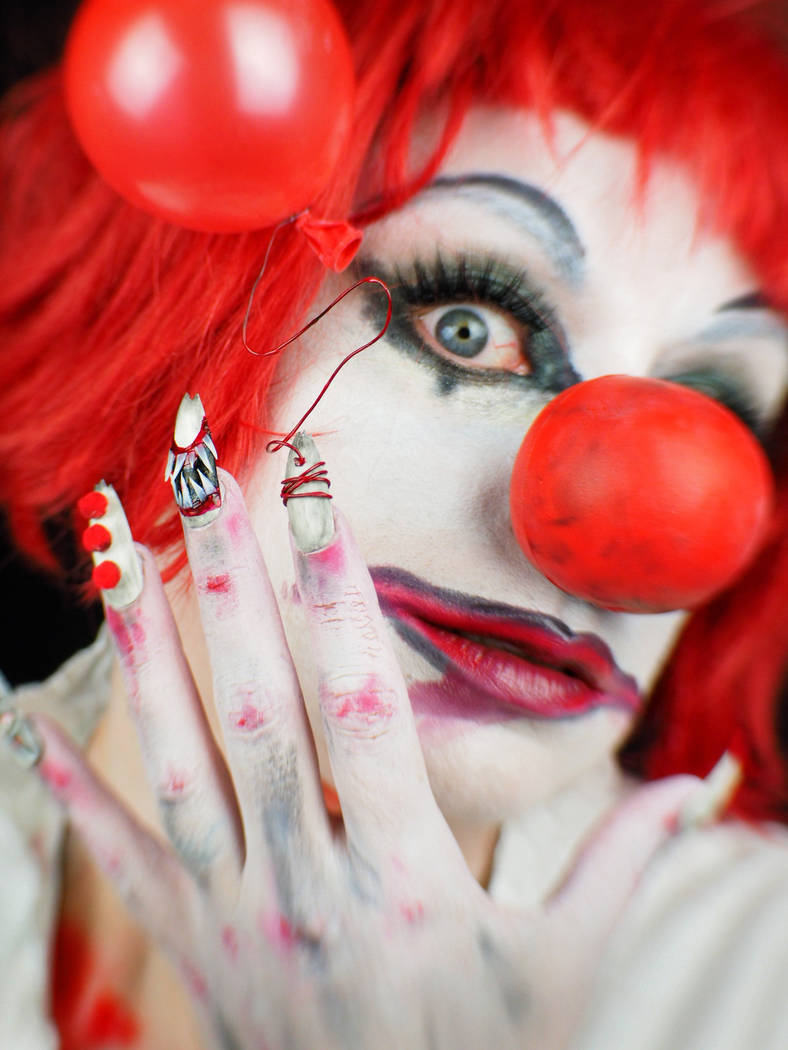 Andrea Lipomi models nails inspired by the movie "IT." Photo by Ginger Bruner.