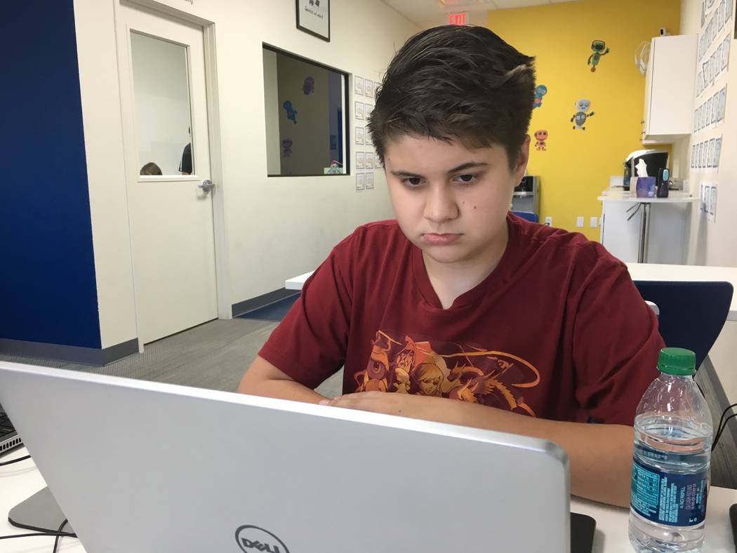 Devin Keenan, who is home-schooled and attends school physically one day a week, says Code Central's program helps him with the computer science assignments he does for school. (Diego Mendoza-Moye ...