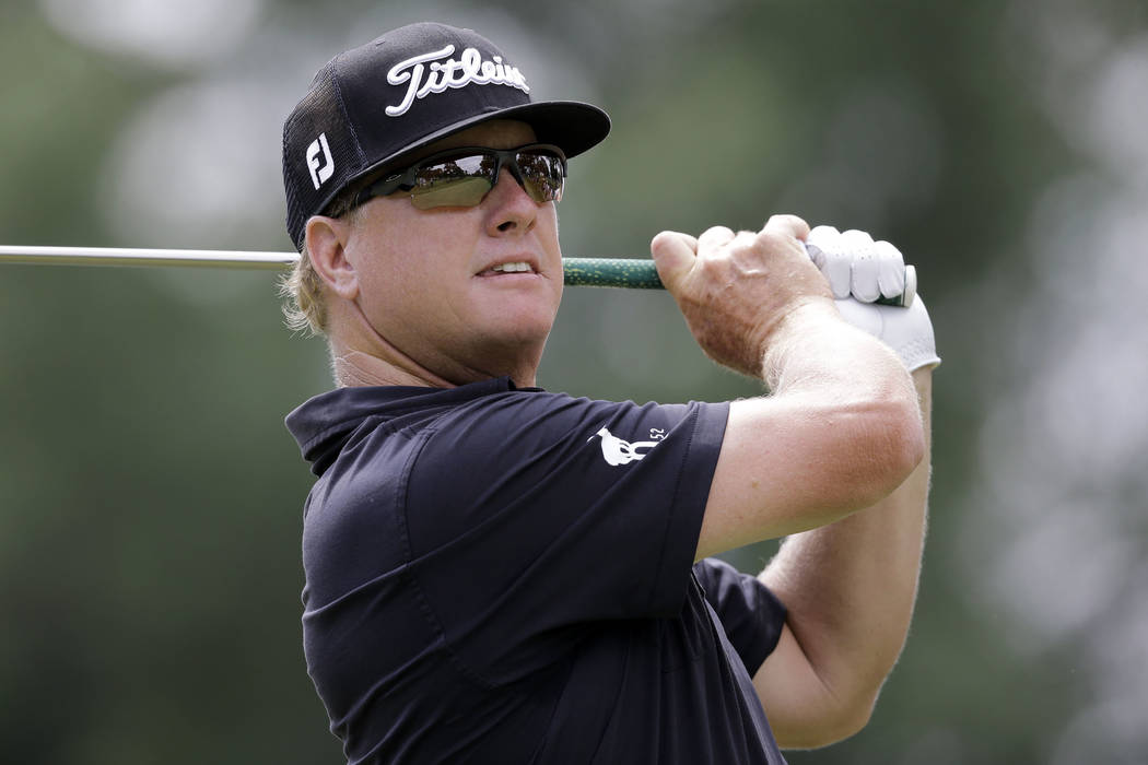 Charley Hoffman tees off on the third hole during the final round of the Bridgestone Invitational golf tournament at Firestone Country Club, Sunday, Aug. 6, 2017, in Akron, Ohio. (AP Photo/Tony Dejak)