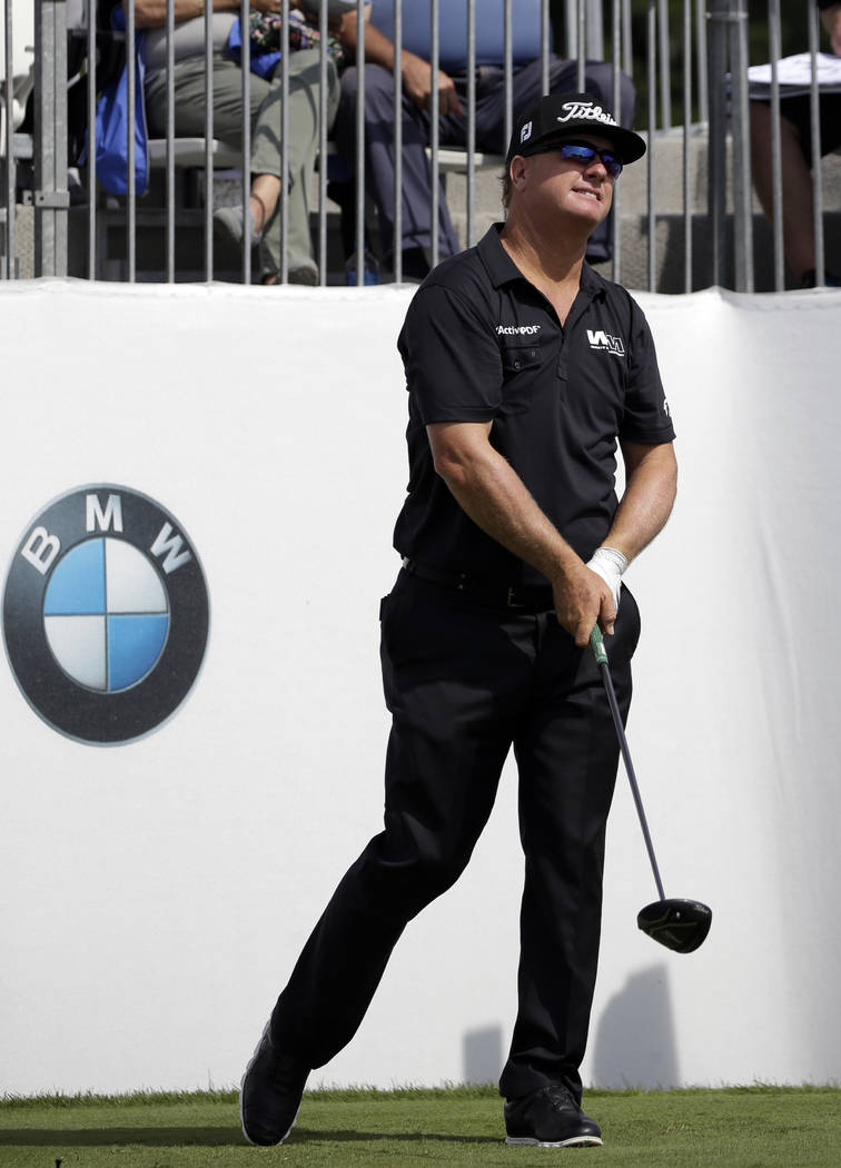 Charley Hoffman watches his tee shot on the 10th hole during the pro-am of the BMW Championship golf tournament at Conway Farms Golf Club, Wednesday, Sept. 13, 2017, in Lake Forest, Ill. (AP Photo ...