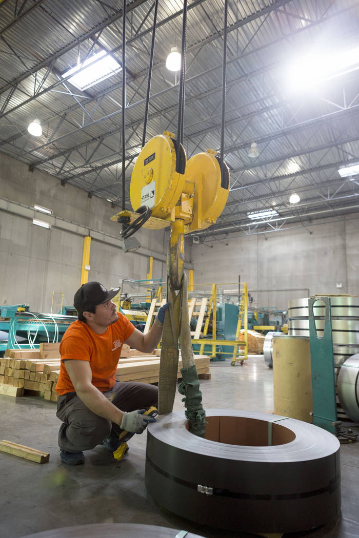 Production engineer Rafael Serna works with the new Slear 2 machine that produces smaller coils at General Design & Construction in Las Vegas, Monday, Oct 30, 2017. Elizabeth Brumley Las Vegas ...