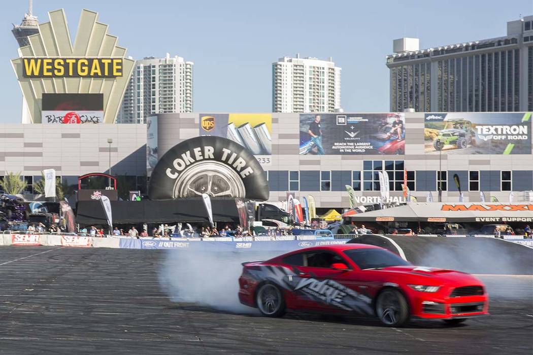 Enhanced Ford cars demonstrate their drifting capabilities on a makeshift racetrack at the SEMA Show.
on Oct. 31, 2017 in Las Vegas. Todd Prince Las Vegas Review-Journal