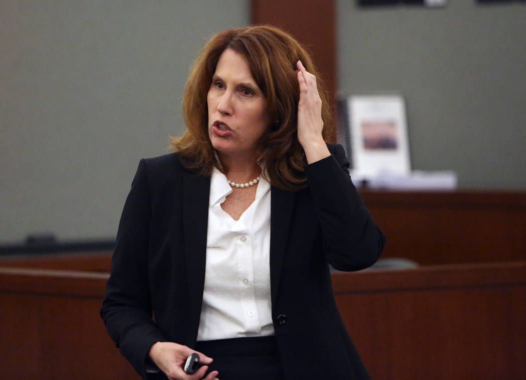 Prosecutor Pam Weckerly delivers her opening statment at the Regional Justice Center Tuesday, Oct. 31, 2017, in the trial of Bryan Clay, accused of raping and killing a woman and her 10-year daugh ...