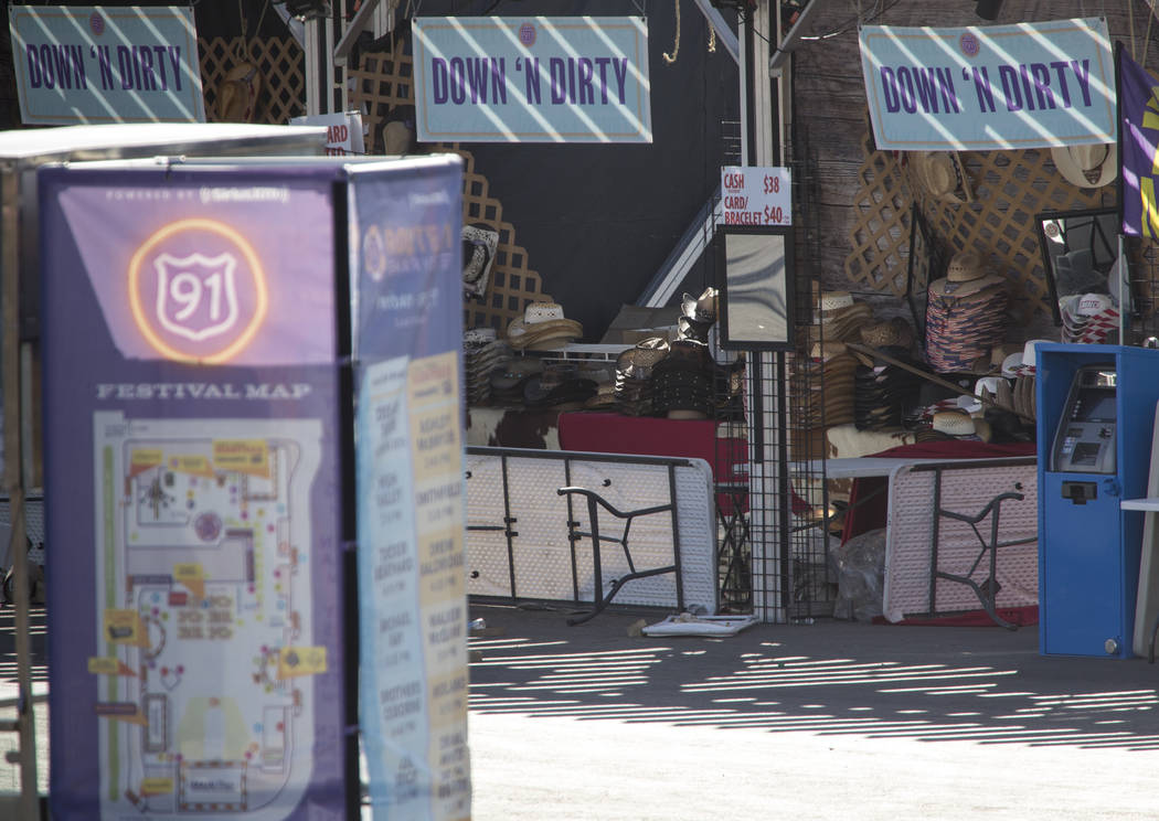 The Down N Dirty Hat Company booth sits frozen in time at the Route 91 Harvest shooting site at Las Vegas Village festival grounds, Tuesday, Oct. 31, 2017. Richard Brian Las Vegas Review-Journal @ ...