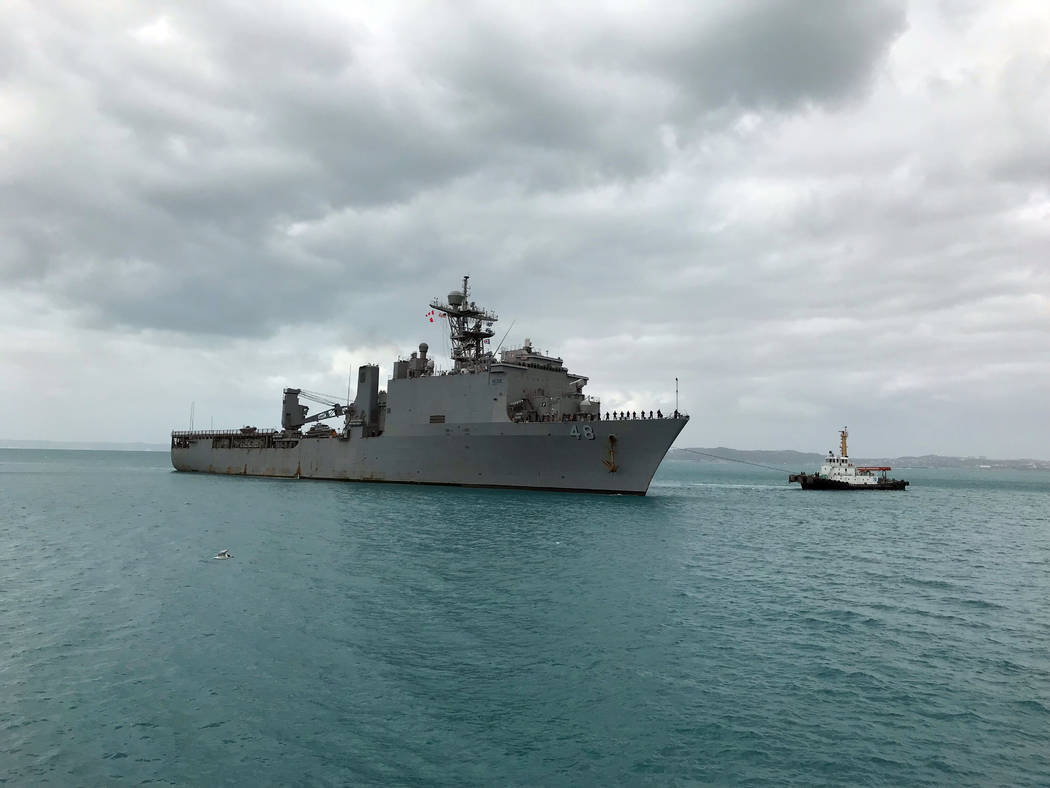 USS Ashland, carrying two women who were rescued after months at sea on their storm-damaged sailboat, arrives at White Beach Naval Facility in Okinawa, Japan Monday, Oct. 30, 2017. The U.S. Navy s ...