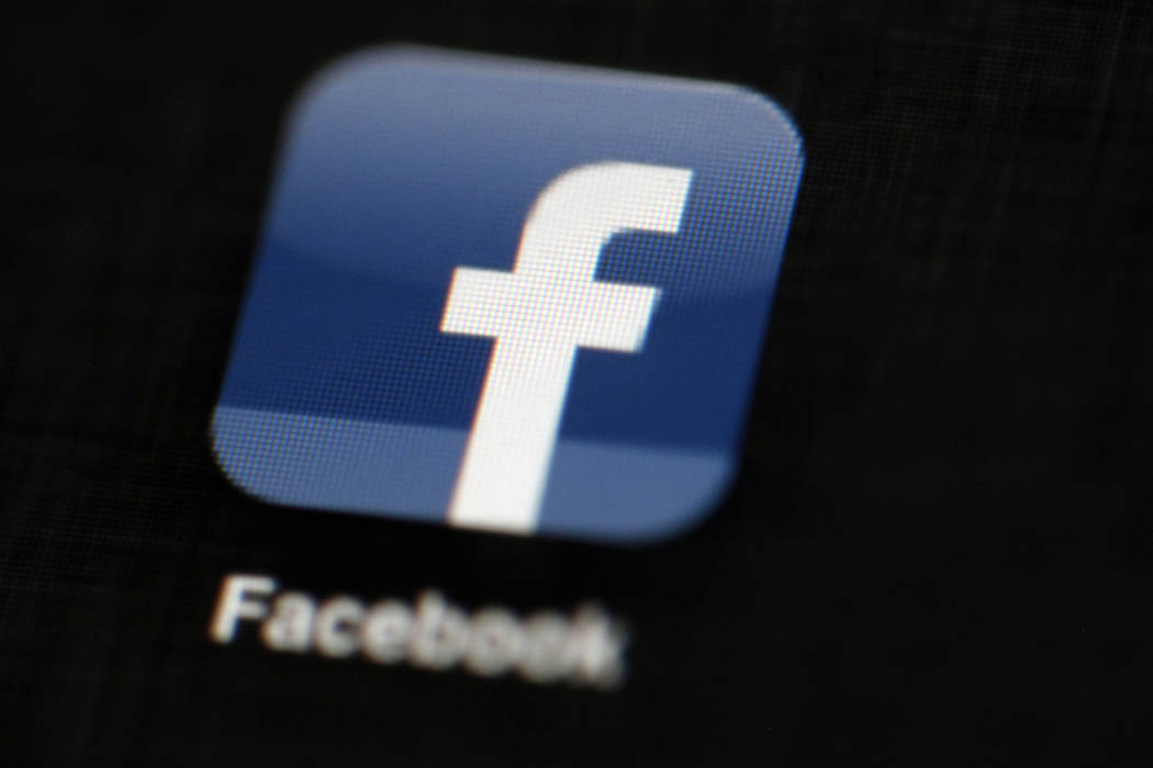 The Facebook logo is displayed on an iPad in Philadelphia on May 16, 2012. (Matt Rourke/AP)