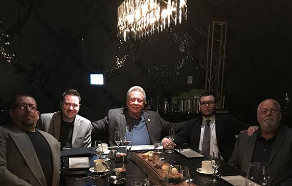 Jesus Campos, the Mandalay Bay security guard who first encountered mass shooter Stephen Paddock, second from right, is shown in an image provided by the International Union, Security, Police and ...