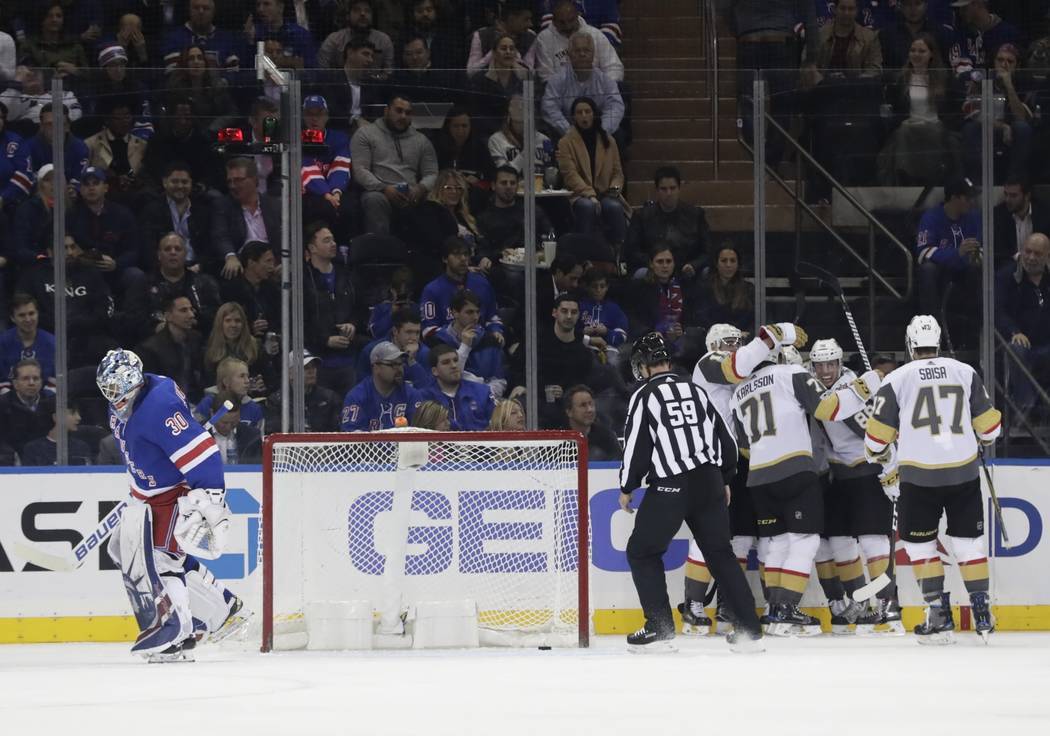 New York Rangers goalie Henrik Lundqvist (30) New York Rangers as the Vegas Golden Knights celebrate a goal by Reilly Smith during the second period of an NHL hockey game Tuesday, Oct. 31, 2017, i ...