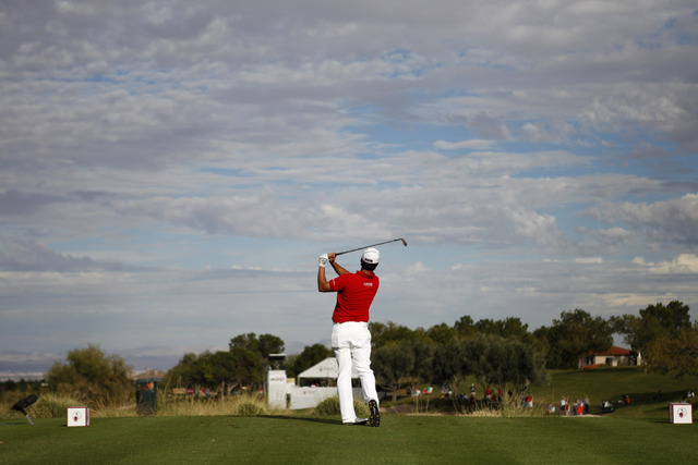 Scott Piercy hits a drive ball from the 17th tee in the third round of the Shriners Hospitals for Children Open golf tournament at TPC Summerlin, 1700 Village Center Circle, in Las Vegas Saturday, ...