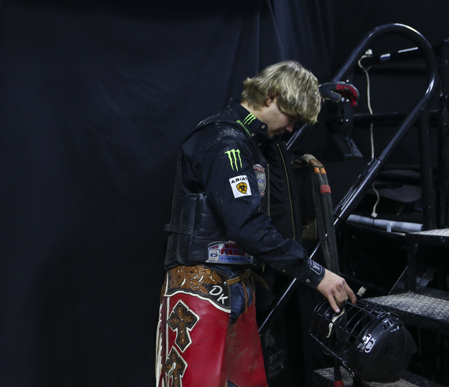 Derek Kolbaba reacts after being bucked off during the second day of the Professional Bull Riders World Finals at the T-Mobile Arena in Las Vegas on Thursday, Nov. 3, 2016. Chase Stevens/Las Vegas ...