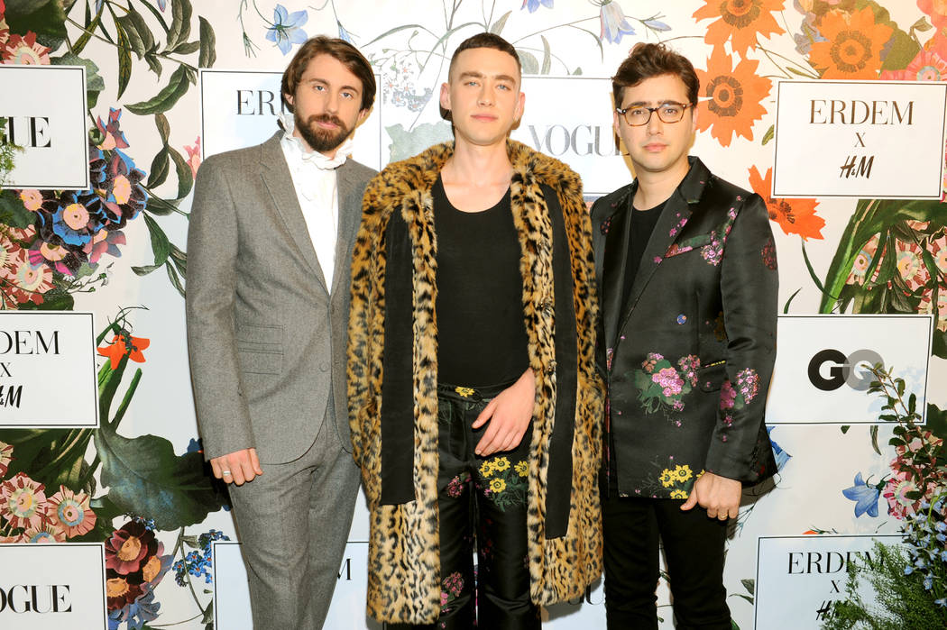 NEW YORK, NY - OCTOBER 24: (L-R) Mikey Goldsworthy, Olly Alexander, and Emre Turkmen of Years & Years attend the ERDEM X H&M Exclusive Event at H&M Flagship Fifth Avenue Store on Octob ...