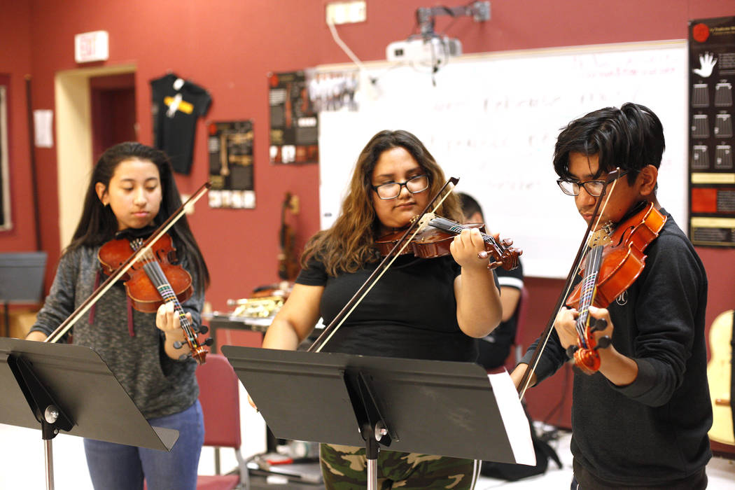 Glenda Torres, 14, from left, Diaany Pineda, 14, and Angel Sandoval, 14, play violins during mariachi class at El Dorado High School in Las Vegas, Wednesday, Oct. 18, 2017. Rachel Aston Las Vegas  ...