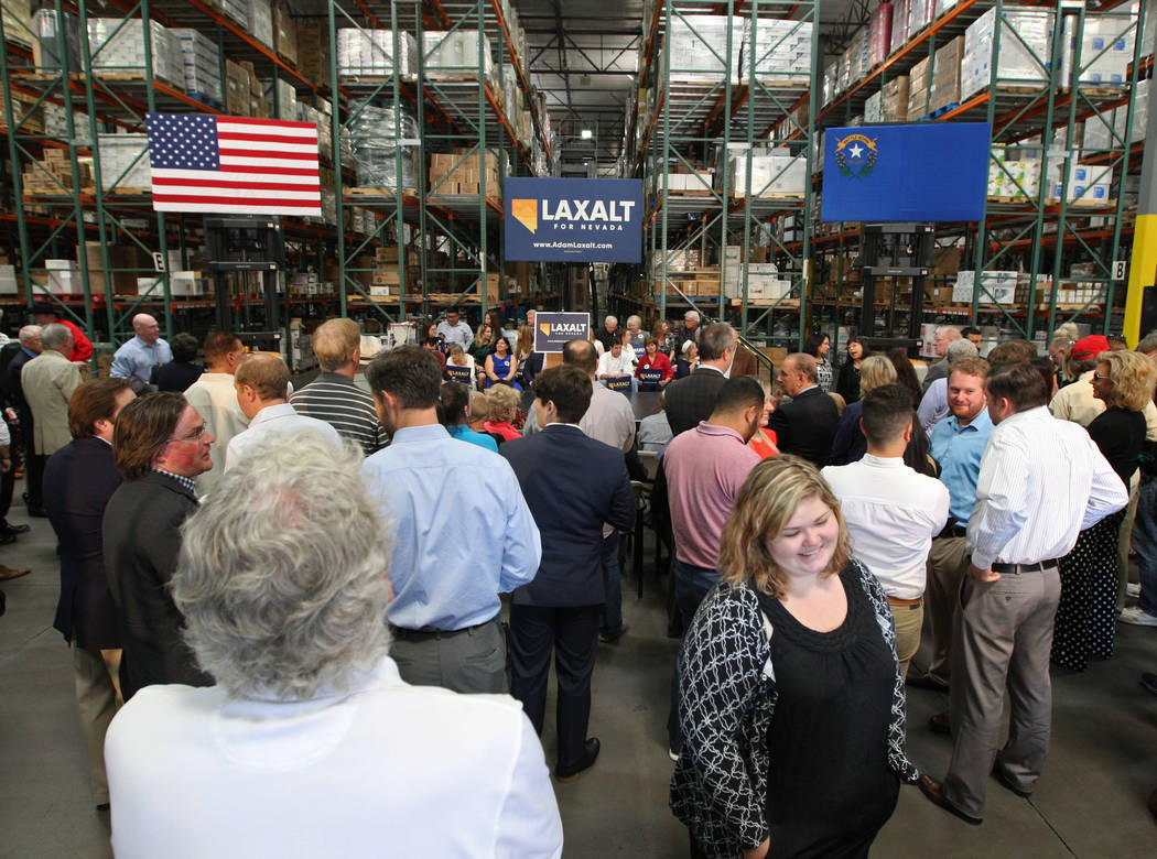 A crowd anxiously waits for Nevada Attorney General Adam Laxalt to announced his candidacy for governor at Brady Industries's warehouse in Las Vegas, Wednesday, Nov. 1, 2017. Gabriella Benavidez L ...