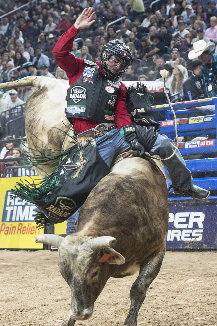 Jose Vitor Leme rides More Big Bucks during the Professional Bull Riders World Finals on Sunday, Nov. 5, 2017, at T-Mobile Arena, in Las Vegas. Leme was the 2017 PBR World Finals Event Winner and  ...