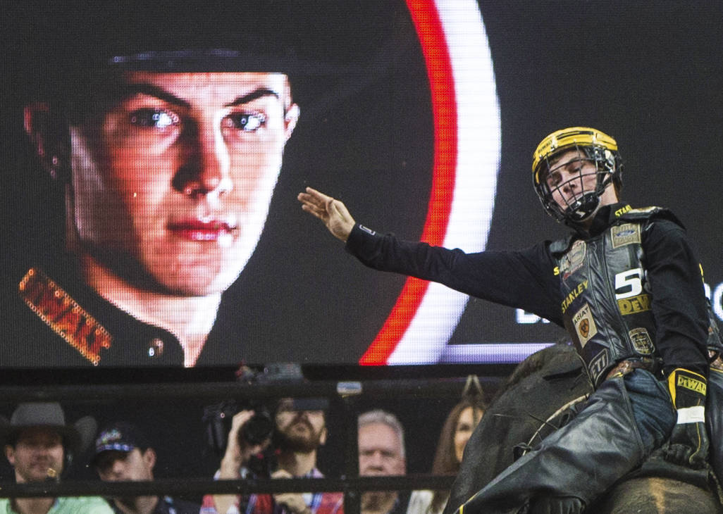 Jess Lockwood rides Short Night during the Professional Bull Riders World Finals on Sunday, Nov. 5, 2017, at T-Mobile Arena, in Las Vegas. Lockwood went on to win the 2017 Professional Bull Riders ...