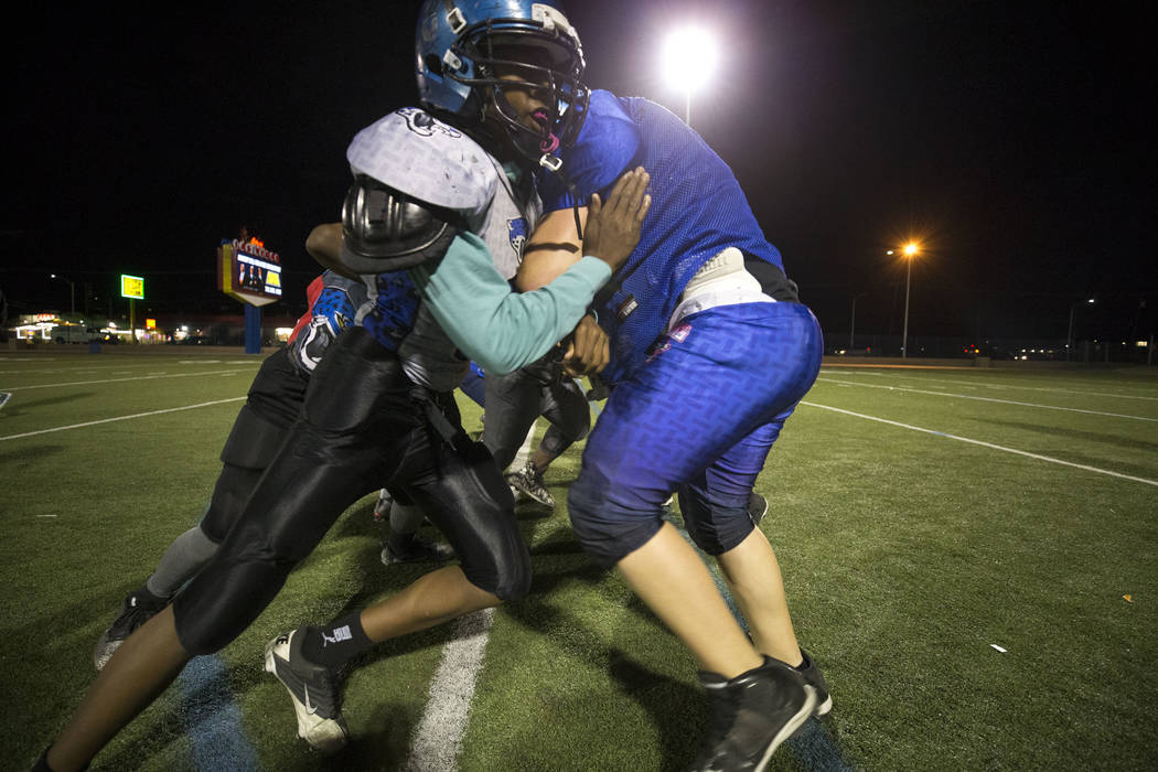Warriors football players run through drills during the team's practice at a football field at Ed Fountain Park, Thursday, Nov. 2, 2017. Richard Brian Las Vegas Review-Journal @vegasphotograph