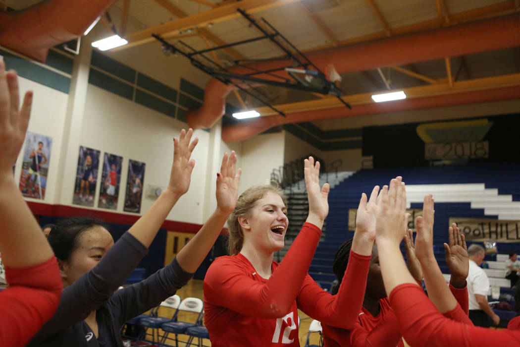 Coronado's Sasha Bolla, 12, celebrates with her teammates after beating Foothill during the Class 4A Sunrise Region volleyball semifinal at Coronado High School in Henderson, Thursday, Nov. 2, 201 ...