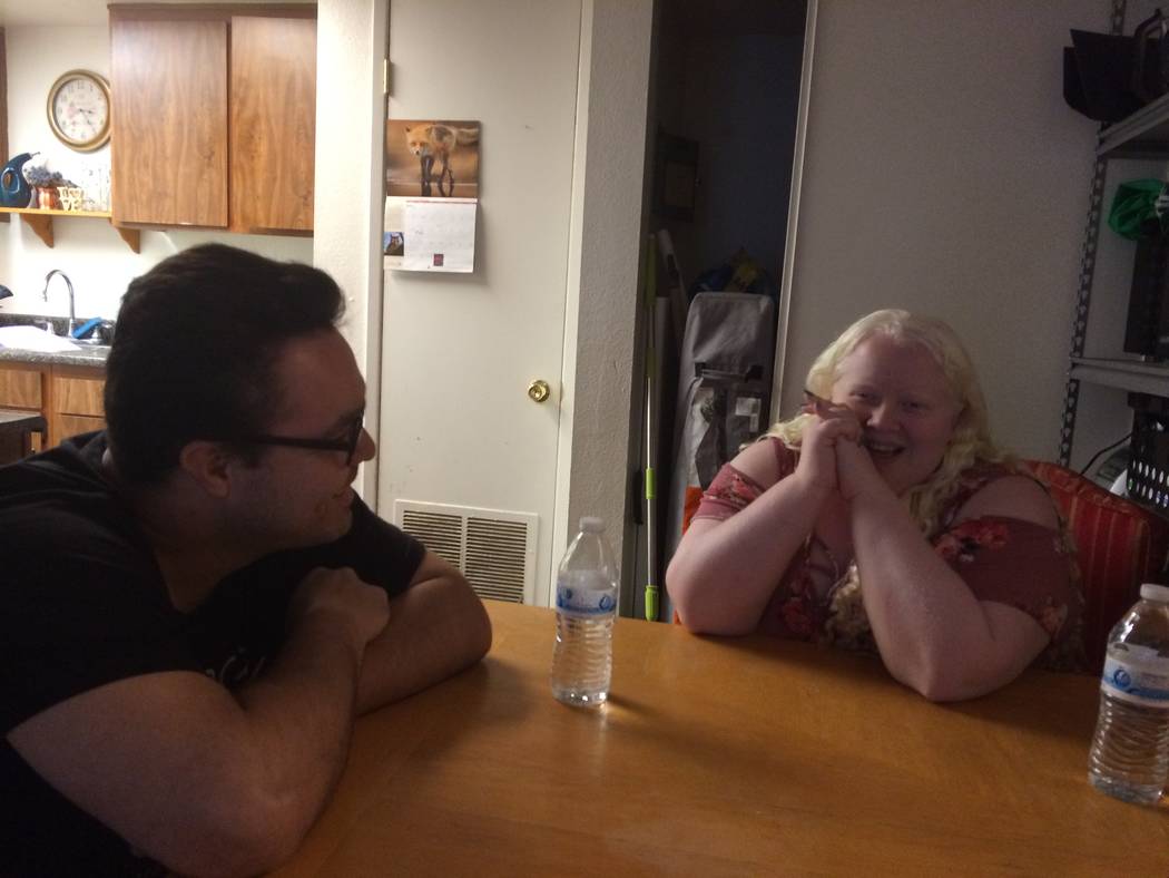 Vanessa Rosado, 25, and her fiance, Oscar Benavides, talk Oct. 20, 2017, about how their lives have changed now that Riley, her Guiding Eyes Labrador retriever, has become part of the family. Rosa ...