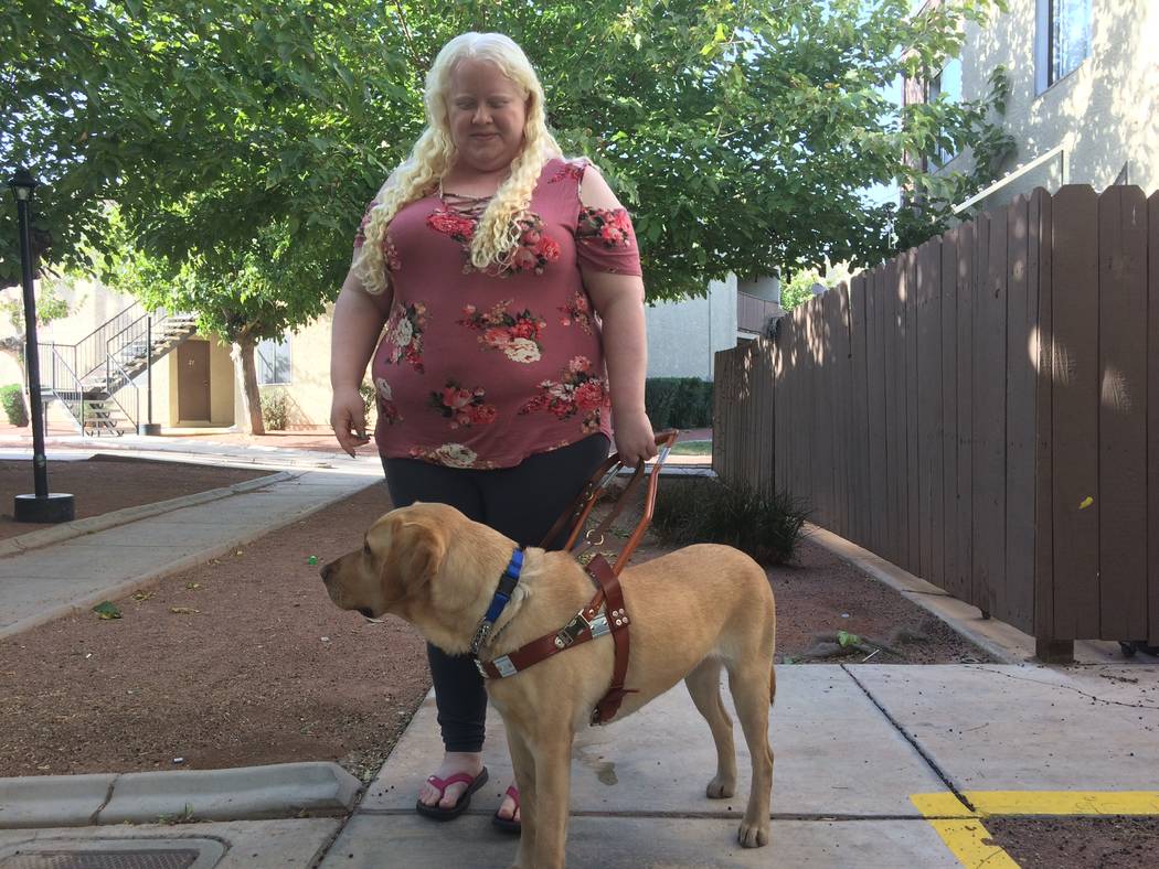 Vanessa Rosado gets ready to take Riley, her new Guiding Eyes dog, on a walk Oct. 20, 2017. Rosado flew to New York where Guiding Eyes for the Blind is headquartered and worked for two weeks with ...