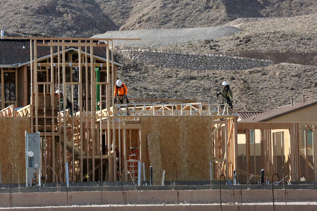 Construction workers put up new homes at Legends, a Lennar development in the Southern Highlands community on Friday, Nov. 3, 2017. Michael Quine/Las Vegas Review-Journal @Vegas88s