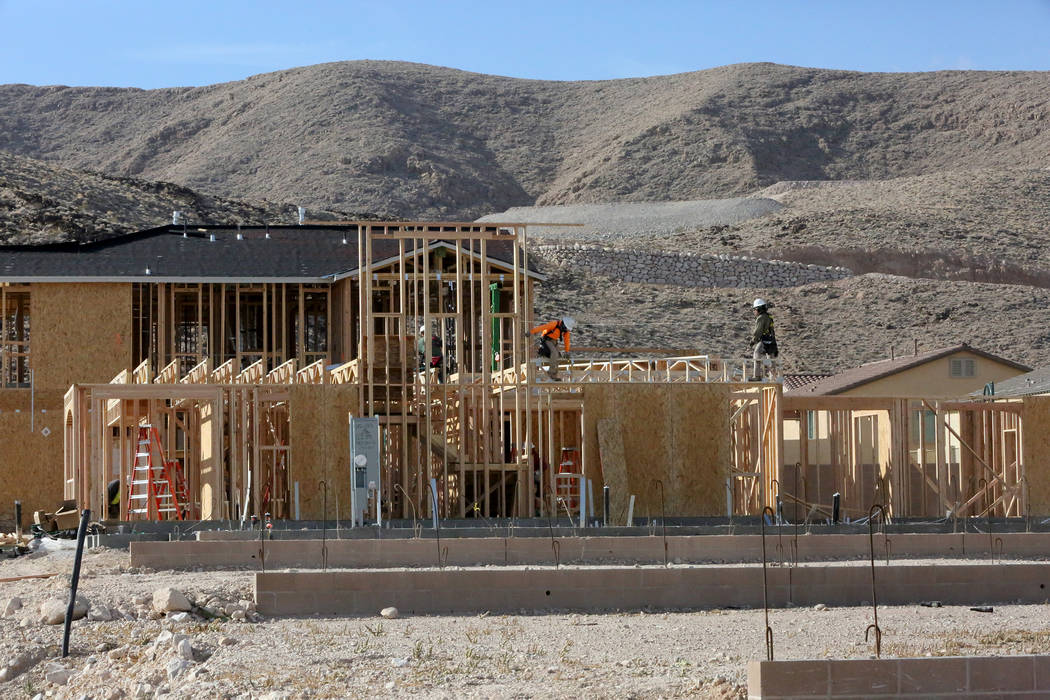 Construction workers put up new homes at Legends, a Lennar development in the Southern Highlands community on Friday, Nov. 3, 2017. Michael Quine/Las Vegas Review-Journal @Vegas88s