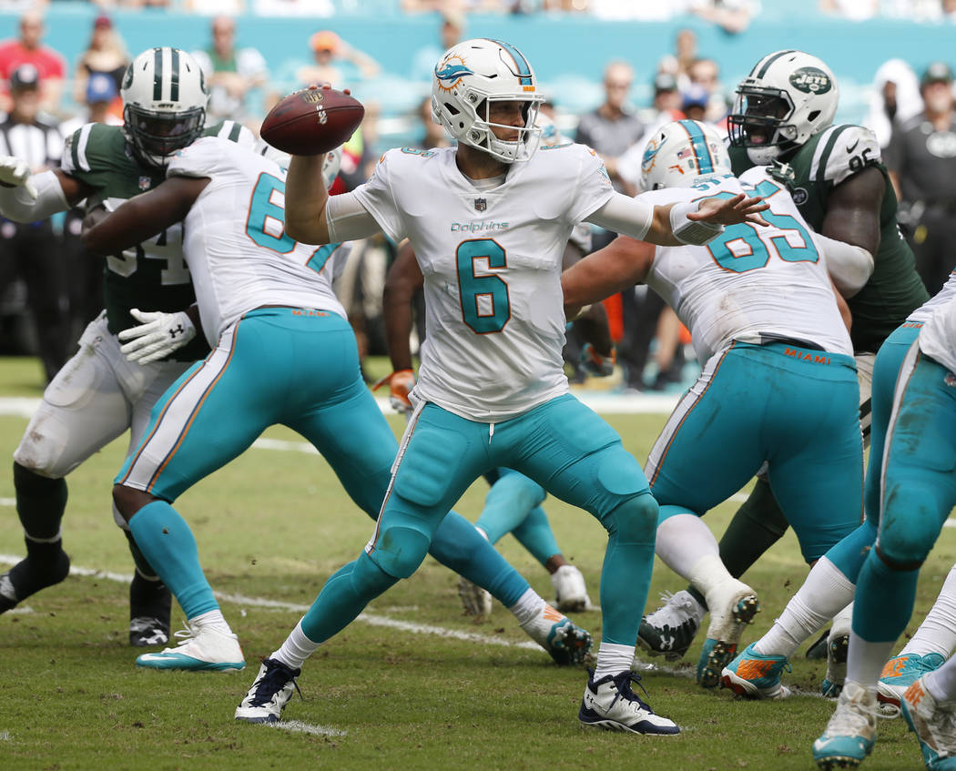 Miami Dolphins quarterback Jay Cutler (6) looks to pass, during the first half of an NFL football game against the New York Jets, Sunday, Oct. 22, 2017, in Miami Gardens, Fla. (AP Photo/Wilfredo Lee)