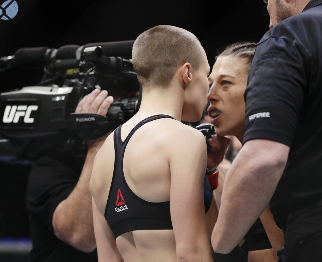 Joanna Jedrzejczyk, right, of Poland, stares down Rose Namajunas before a women's strawweight title mixed martial arts bout at UFC 217 on Saturday, Nov. 4, 2017, in New York. Namajunas won the fig ...