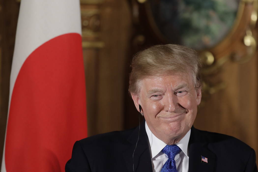 President Donald Trump speaks, accompanied by Japanese Prime Minister Shinzo Abe during a joint news conference at the Akasaka Palace, Monday, Nov. 6, 2017, in Tokyo. (Kiyoshi Ota/Pool Photo via AP)