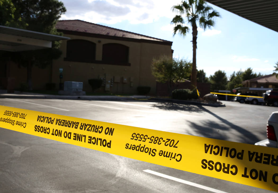Henderson police use yellow tape to close off the crime scene inside an apartment complex in the 900 block of Seven Hills Drive on Thursday, Nov. 2, 2017, in Henderson. Bizuayehu Tesfaye/Las Vegas ...