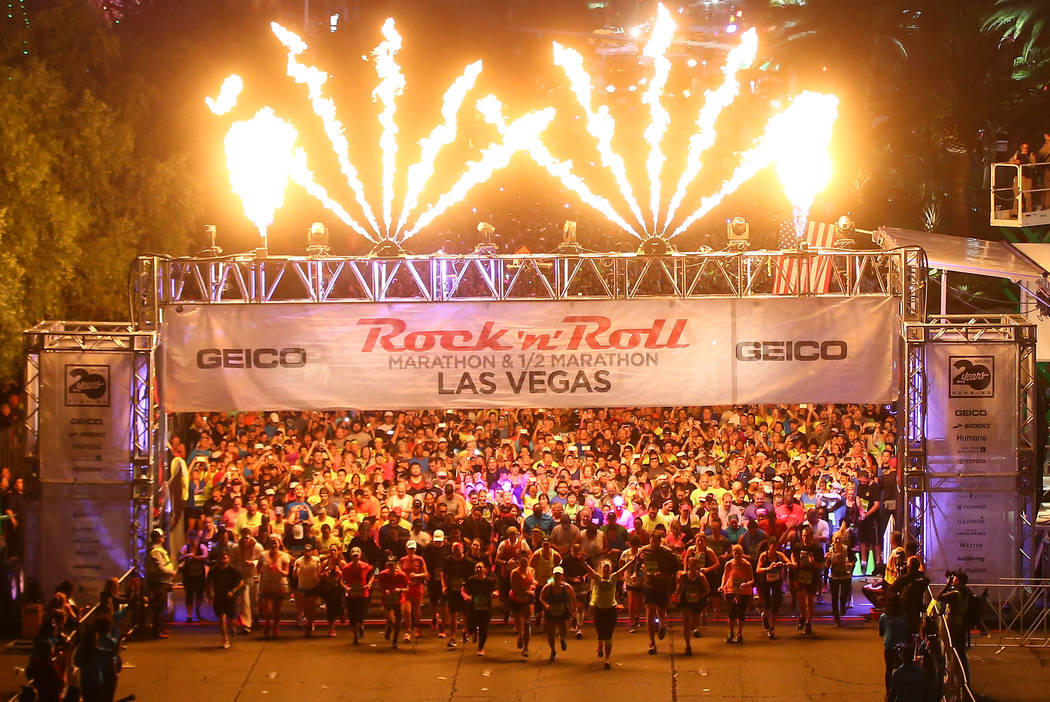 Half marathon participants head out from the start of the Rock 'n' Roll Marathon in Las Vegas on Sunday, Nov. 12, 2017. Chase Stevens Las Vegas Review-Journal @csstevensphoto