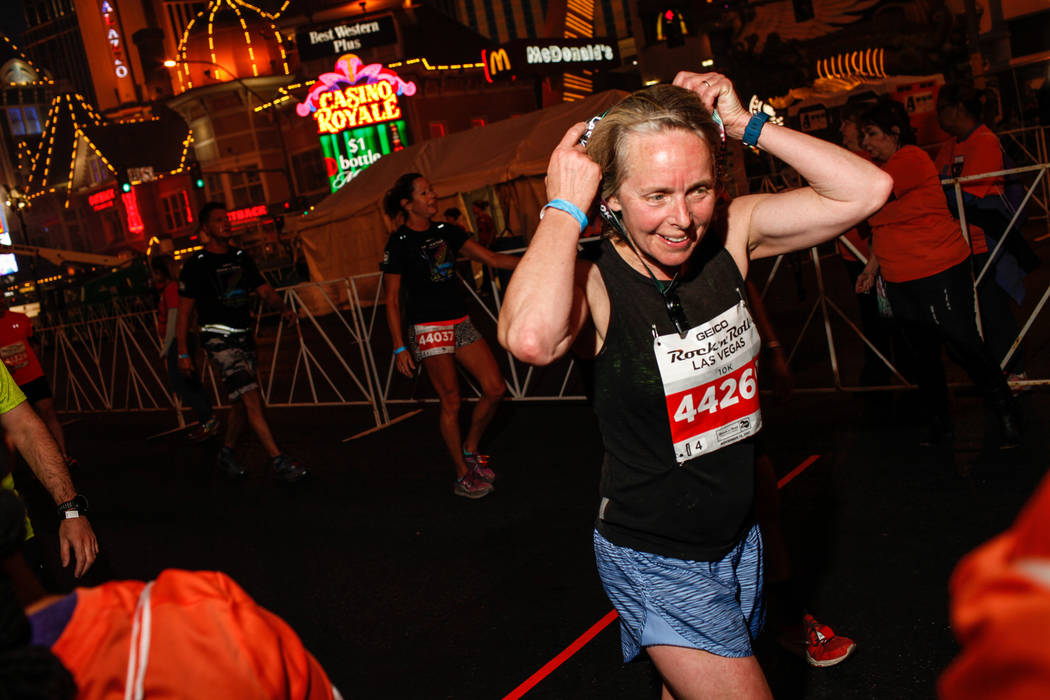 Catherine Baran of Sandspit crosses the finish line at the 10K run of the Rock 'n' Roll Las Vegas Marathon along the Strip near The Mirage in Las Vegas, Sunday, Nov. 12, 2017. Joel Angel Juarez La ...