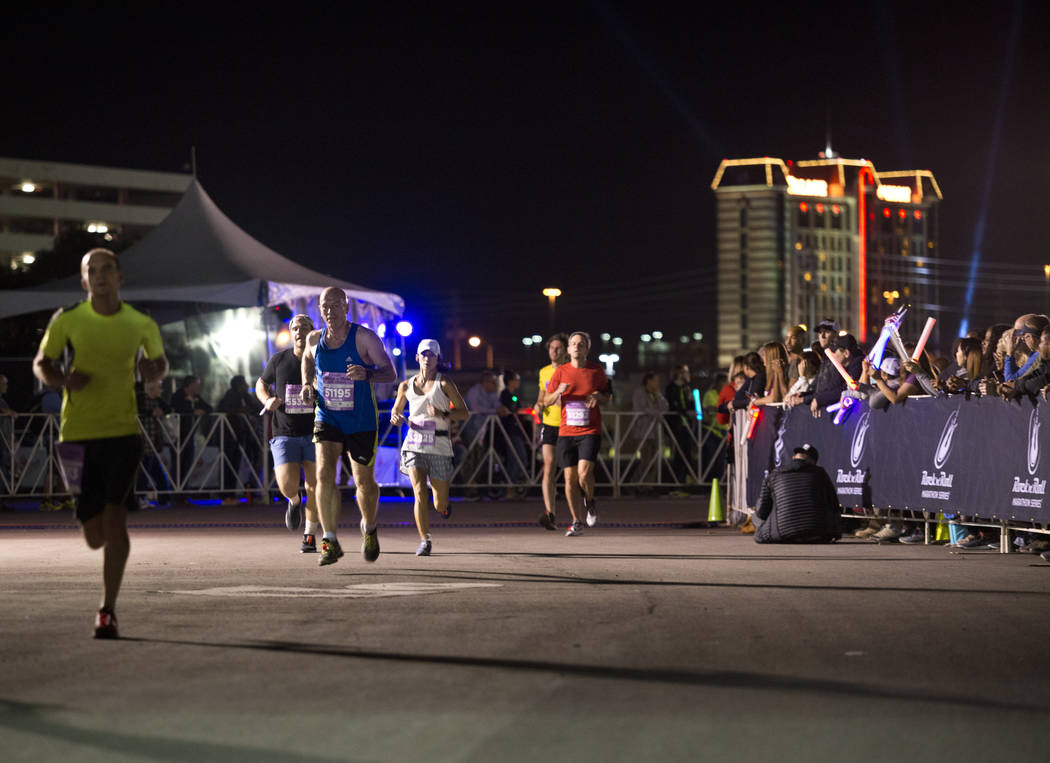 Runners complete the final stretch of the 5K portion of the Rock ԮՠRoll Las Vegas Marathon at the Las Vegas Festival Grounds on The Strip on Saturday, Nov. 11, 2017. Daniel Clark/Las V ...