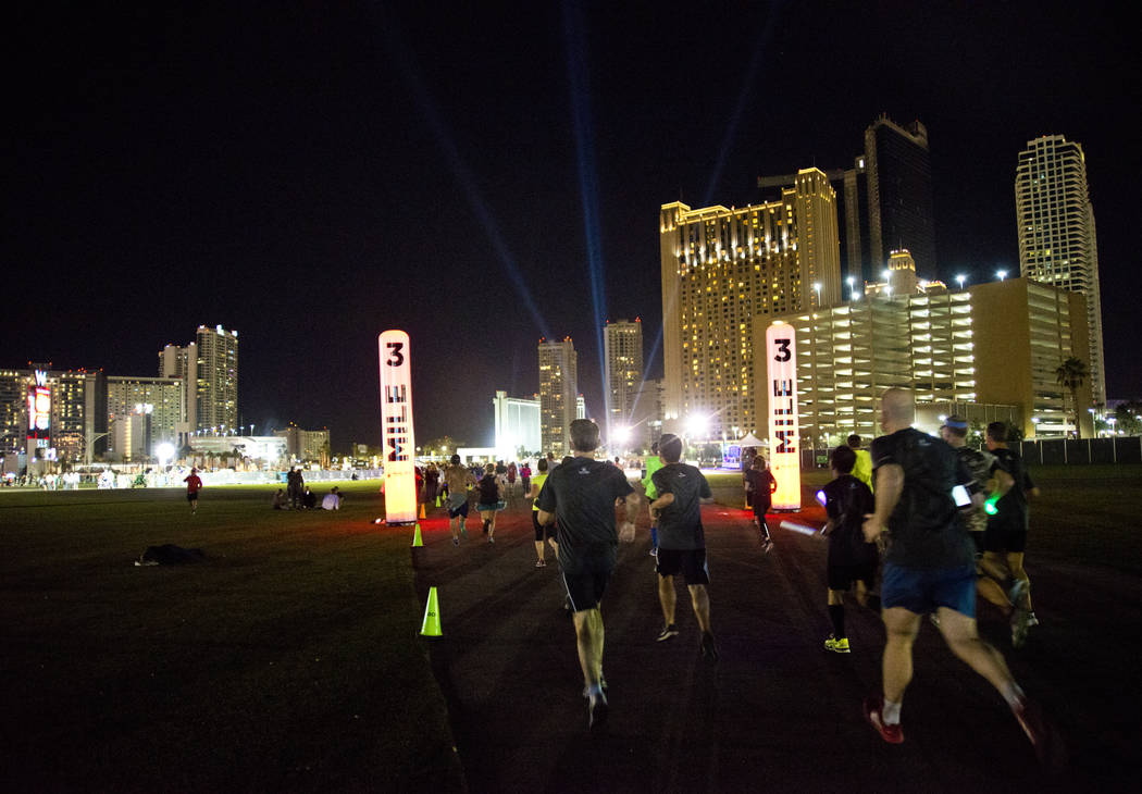 Runners approach the third mile of the 5K portion of the Rock ԮՠRoll Las Vegas Marathon at the Las Vegas Festival Grounds on The Strip on Saturday, Nov. 11, 2017. Daniel Clark/Las Vega ...