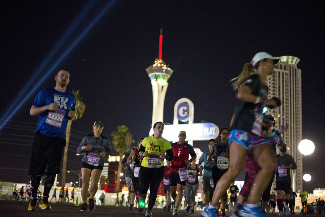Runners approach the third mile of the 5K portion of the Rock ԮՠRoll Las Vegas Marathon at the Las Vegas Festival Grounds on The Strip on Saturday, Nov. 11, 2017. Daniel Clark/Las Vega ...