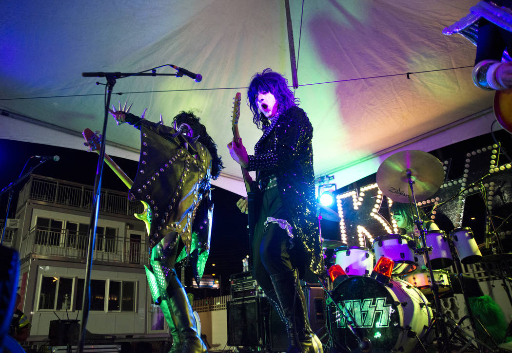 Kissed Alive, a KISS tribute band, performs during the 5K portion of the Rock ԮՠRoll Las Vegas Marathon at the Las Vegas Festival Grounds on The Strip on Saturday, Nov. 11, 2017. Danie ...