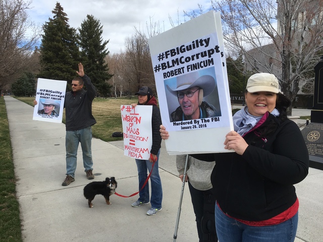 Marki Marius of Milford, Calif., protests the death of LaVoy Finicum at a rally Saturday in front of the state Capitol in Carson City.