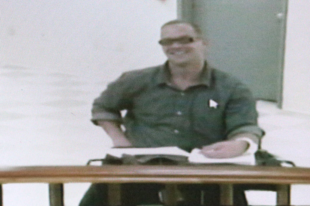 Scott Dozier, a convicted murderer who wants to be executed, appears in court via video conference on Wednesday, Nov. 8, 2017, four business days before his scheduled execution. Michael Quine/Las  ...