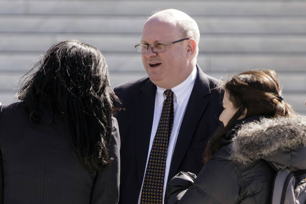 Attorney Marc Elias, one of several lawyers who appeared in the in the case of Wittman v. Personhuballah, stands on the plaza of the Supreme Court in Washington on March 21, 2016 (J. Scott Applewh ...