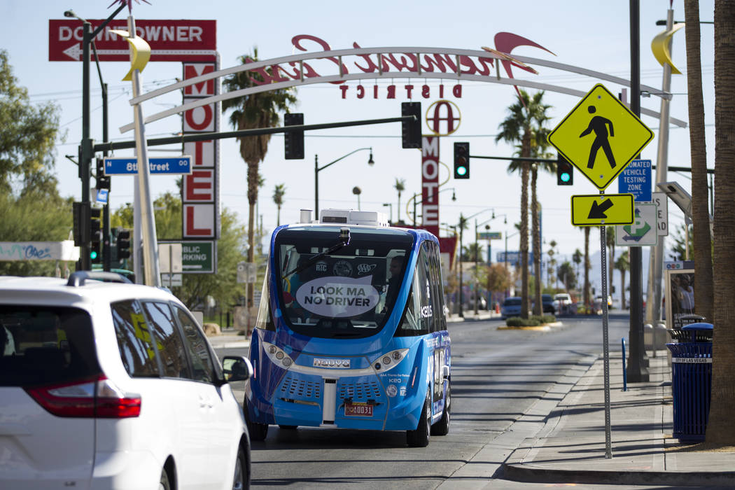 A driverless electric shuttle tours passengers downtown following a launch event at the Container Park in Las Vegas, Wednesday, Nov. 8, 2017. Erik Verduzco Las Vegas Review-Journal @Erik_Verduzco
